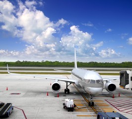 aircraft airplane plane landed airport blue sky