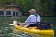 © 2tun - Close up of Man Fishing in a Kayak