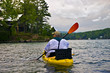 © 2tun - Man in Kayak on a Lake