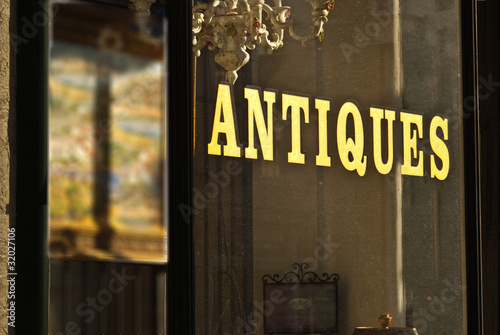Fotografie, Obraz Antique store window sign wilth gold letters
