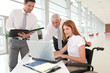 © goodluz - Handicapped woman attending a meeting in office