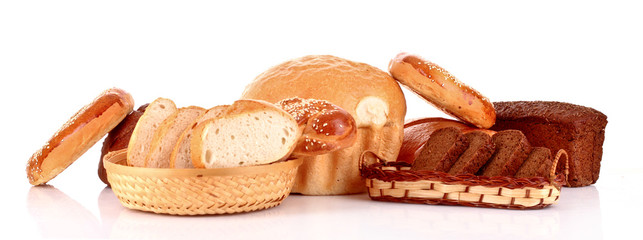 Wall Mural - baked bread assortment on red background