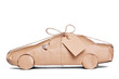 Car wrapped in brown paper cut out