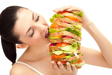 girl eating sandwich, big bite