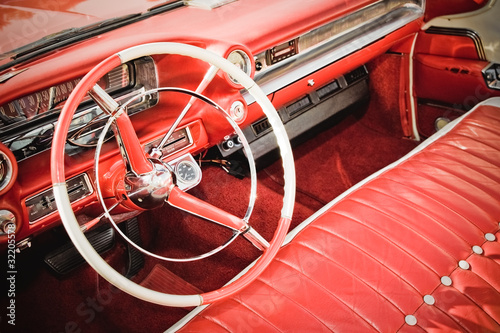 Naklejka na szybę classic car interior with red leather upholstery