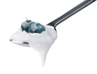 Poster - Isolated yogurt. Spoon of natural yogurt with fresh blueberries on top isolated on white background