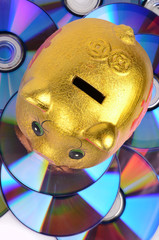 Poster - piggy bank and DVD