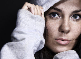 beautiful young woman in white hoodie