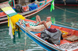 burma fisherman on colorful boat