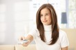 © nyul - Attractive woman with remote control