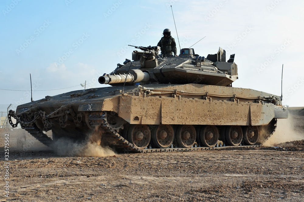 Papel de parede Man in field with tank and weapons