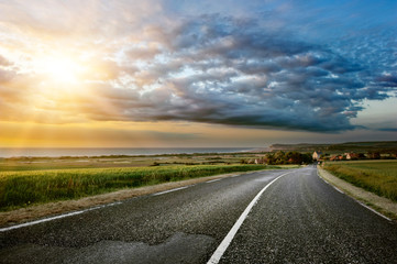 Sunset landscape with coastal road