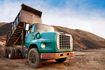 Dump truck at excavation site