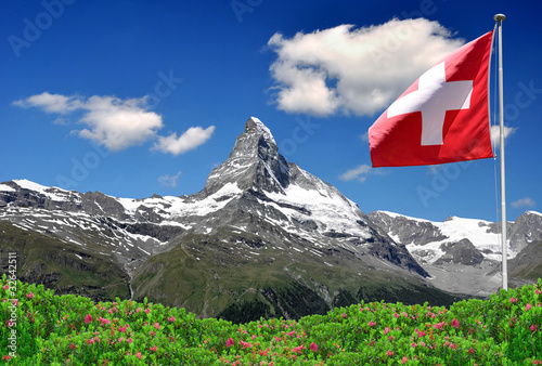 Fotografie, Obraz Beautiful mountain Matterhorn with Swiss flag - Swiss Alps