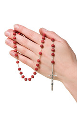 Wall Mural - female hands with rosary. isolated on white.