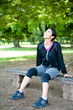 © taka - beautiful asian woman relaxing in the park