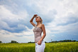 © danielkrol - Blond woman on yelow meadow