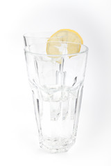 A glass of mineral water with a lemon