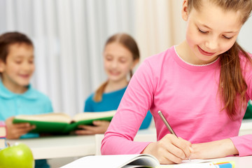 Wall Mural - Girl writing