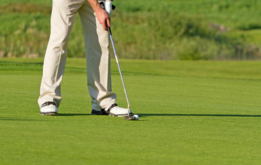 Golfer on the course at the hole