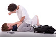 © AlexandreNunes - child crying on the floor child being beaten by a teenager