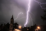 Fototapeta Na sufit - Lightning and church