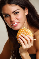 Wall Mural - woman eat burger