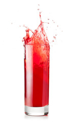 Wall Mural - red liquid is spalsing in glass