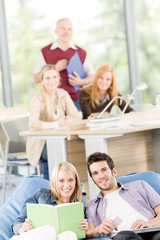 Wall Mural - High-school students with mature professor listen music