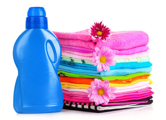 Sticker - Pile of colorful clothes over white background