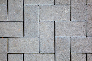 pavement pattern made with cast concrete blocks in grey color