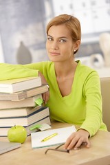 Wall Mural - Portrait of college girl with books