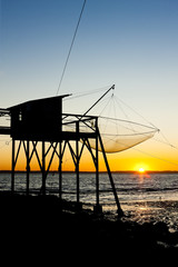  pier with fishing net during sunrise, Gironde Department, Aquita