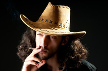 Man In Cowbow Hat Smoking