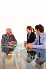 two men and one woman during a job interview