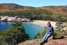 Tourist Relaxing In Acadia National Park