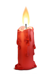 burning candle isolated over white