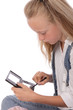 © mariesacha - fillette de 9 ans avec console de jeu vidéo