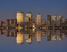 Lower New York City Skyline With Mirror Image River Reflection