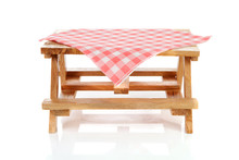 Empty Picnic Table With Tablecloth