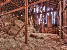 Interior Of Old Barn With Straw Bales