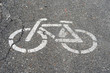 © Unkas Photo - Bicycle lane road sign on gray asphalt