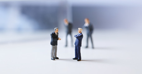  Miniature figurines of successful business team.