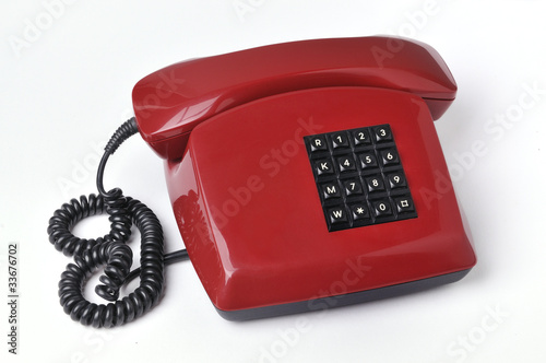 Rotes Telefon – kaufen Sie dieses Foto und finden Sie ähnliche Bilder