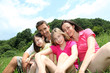 © goodluz - Happy family sitting in park