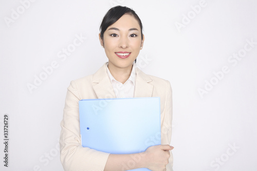 ファイルを両手で持つビジネスレディ Buy This Stock Photo And Explore Similar Images At Adobe Stock Adobe Stock