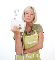 Sticker - Portrait of senior woman holding mixer
