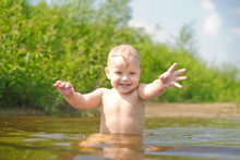 Adorable Baby Walk In River Water