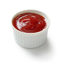 Tomato Ketchup In Ramekin On White Background