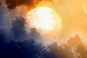Wall Mural - dramatic sky with glowing planet